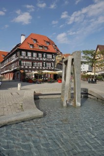 Suburban fountain with hotel restaurant Alte Post, half-timbered house, water basin, Nagold Valley,