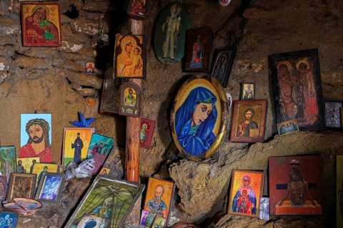 Close-up of icons in a cave with religious atmosphere, chapel, Agios Nikolaos, rock chapel, Oasis