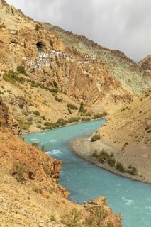 Phugtal Monastery, perched on a cliff in the Lungnak Valley, Ladakh, offers a breathtaking view of