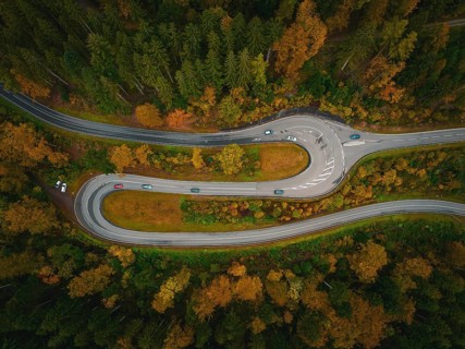 S-bend in the deep autumn forest, Hirsau, Calw, Black Forest, Germany