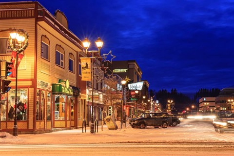 Historic buildings, houses, city, cars, shops, shopping, twilight, blue hour, illuminated, winter,