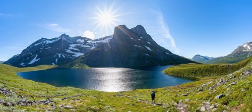 View of mountain landscape and lake Giklingdalsvatnet, Flatvaddalen high valley, Sun Star,