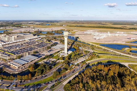 Aerial view of Orlando International Airport with Terminal Concourse Airside 4 and Tower in