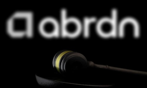 Court gavel in front of the abrdn logo. Abrdn plc is a United Kingdom based global investment