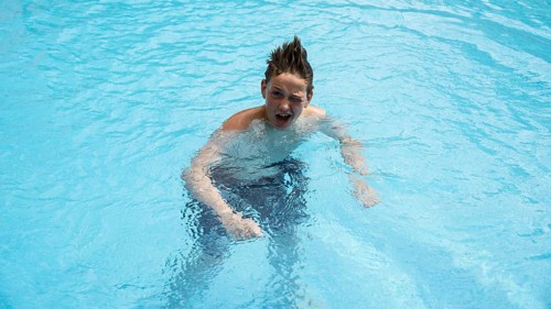 Thirteen-year-old boy, swimming pool