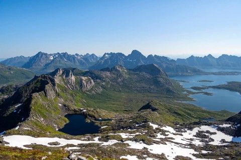 Mountains and fjord landscape, view from the summit of Rundfjellet, fjord Austenesfjord and lake