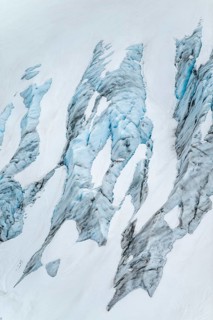 Blue rugged glacier ice with crevasses and snow, detail, Exit Glacier, Kenai Peninsula, Alaska, USA