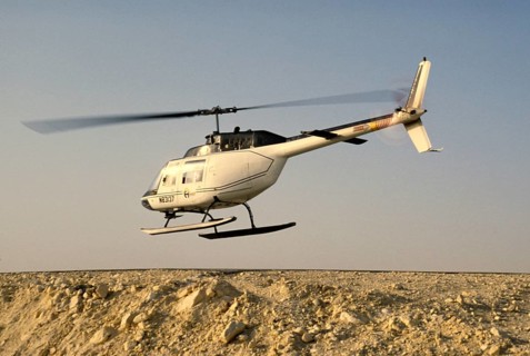 Oil industry in the Ras Tanura area, Saudi Arabia, Bell 206 JetRanger helicopter 1979