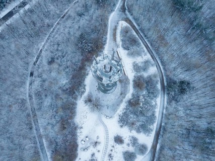 Tower in a snowy forest landscape seen from above, cold winter nature, Schönbuchturm, Herrenberg,