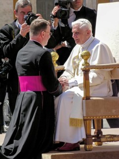 Pope Benedict XVI Joseph Ratzinger welcomes a bishop to the 1st audience on 27. 04. 2005, St.