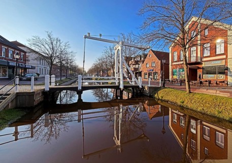 Historic wooden folding bridge over the main canal, Papenburg, is also called Venice of the North,