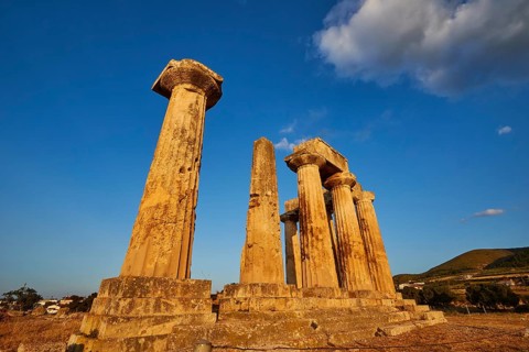 Archaic Temple of Apollo, Doric Columns, Columns of an ancient temple in the light of the sunset