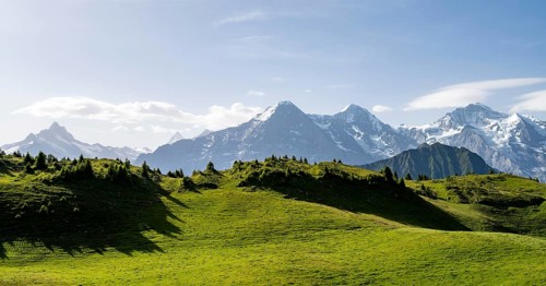 Picturesque mountain landscape, mountain panorama with peaks Eiger, Mönch and Jungfrau,
