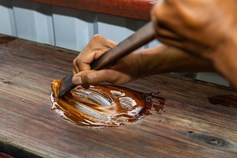 Heated sugar cane mass is ground into caramel (Saccharum officinarum), sweet grasses (Poaceae),