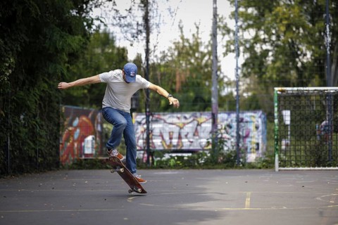 A man does an ollie on a skateboard in Berlin, 16/08/2024
