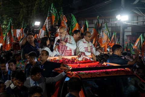 Amit Shah addressing press during a road show of the Bharatiya Janata Party ahead of the Assam