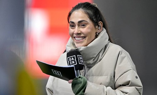 DAZN reporter presenter Ann-Sophie Kimmel, portrait, smiling, in interview microphone microphone