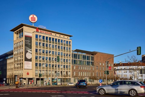 Main office Sparkasse Saarbrücken, modern architecture, brick buildings, car, traffic light