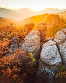 Dramatic aerial drone view over sandstone rock formations of Belogradchik in Bulgaria surrounded by
