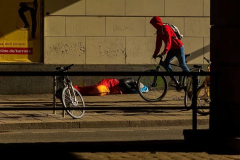 Homeless person at Dresden Central Station, Dresden, Saxony, Germany