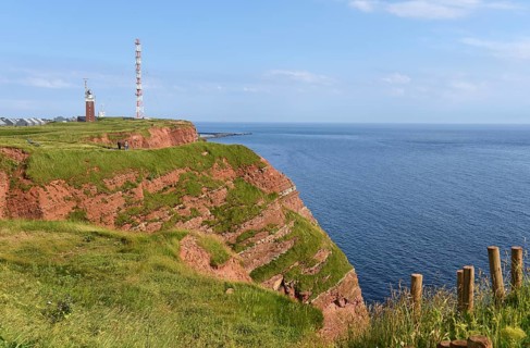 Lighthouse and radio mast on the offshore island of Heligoland, Schleswig-Holstein, Germany