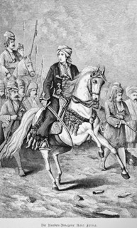 The Kurdish Amazon Kara Fatma, Turkish national heroine riding a grey horse, decorated horse, sword