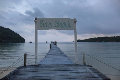 Jetty on Siam Beach in front of sunrise, Ko Kut or Koh Kood, Gulf of Thailand, Thailand