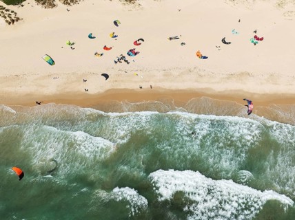 Kite surfers at the Los Lances beach near Tarifa. Aerial view. Drone shot. Cádiz province,