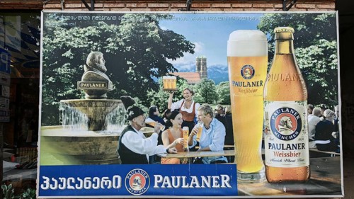 Advertisement for Paulaner Bier in Georgian script on an advertising poster, Georgia