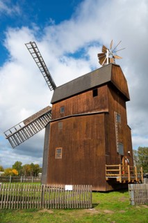 Traditional wooden windmill in front of a cloudy sky, Paltrock windmill, Parey, Elbe-Parey,