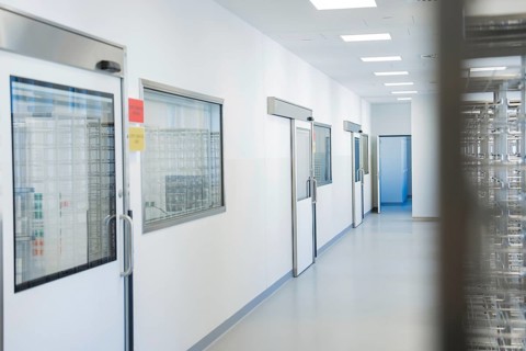 Modern hospital corridor with several doors and sterile atmosphere, operating room in the new Calw