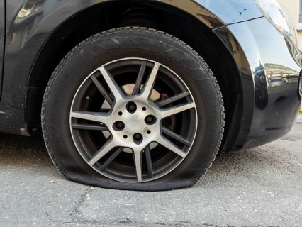 A flat tyre on a car, Wuppertal, Germany