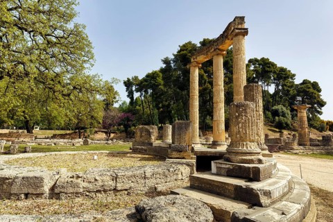 Philippeion, restored ruins, rotunda, ancient Olympia in spring, archaeological site, sanctuary of