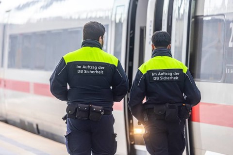 Berlin Central Station. Security personnel on patrol on the platform on behalf of DB Sicherheit.
