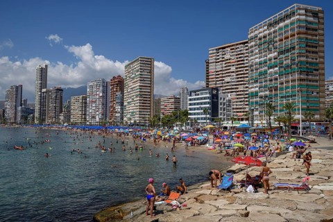 Many tourists on the beach in front of skyscrapers, Playa Levante, Benidorm, Alicante province,