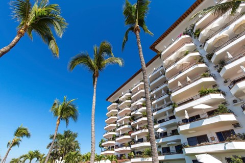 Luxury condominiums and apartments on Playa De Los Muertos beach and pier close to the famous