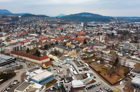 Drone shot, townscape with residential buildings and shopping centres, town view, Feldkirchen in