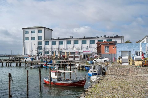 Fishing boats and fish shops at the city harbor, Sassnitz, Rügen, island, Baltic Sea,