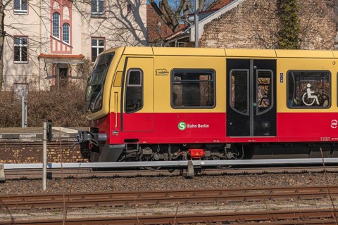 Berlin S-Bahn train in front of the entrance to Lichterfelde West station, Berlin, Germany