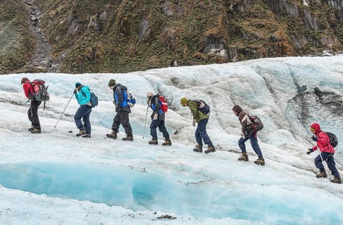 Group of walkers on glacier, Fox Glacier, Westland National Park, South Island, New Zealand