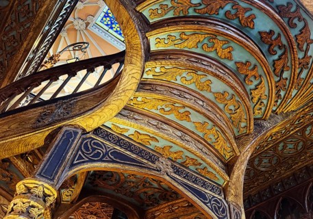 Livraria Lello, interior view of the Lello bookstore with rich decorations of the curved wooden