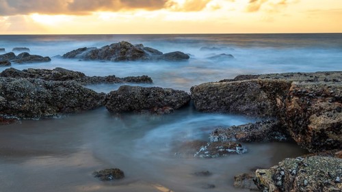 Sunrise on the beach, coast near Sadah, Oman
