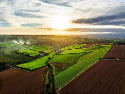 Colours of autumn Fields and Farms over Sheldon from a drone, Torbay, Devon, England, United