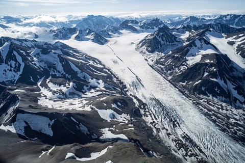 Snow and ice, epic mountains with glaciers, aerial view, Alaska Range, Denali National Park,