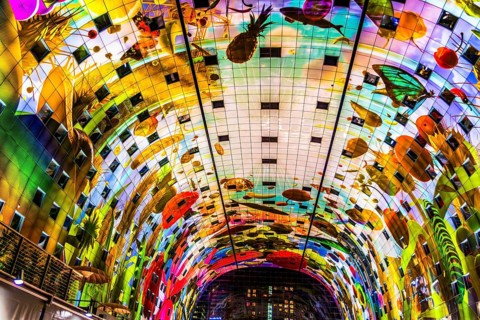Markthal from 2014, offers over 100 food stalls and delicatessens with spectacular ceiling fresco