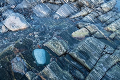 Rock structures on the coast, Söröya, Finnmark, Norway, February 2019