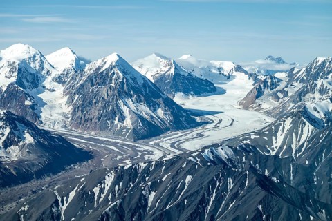 Snow and ice, epic mountains with glaciers, aerial view, Alaska Range, Denali National Park,