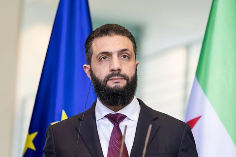 Ahmed al-Sharaa (President of the Syrian Arab Republic) at a joint press conference with Friedrich
