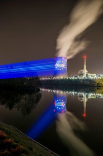 Protest action broadcast by the anti-nuclear organization, projection, night view, 05-03-2026,