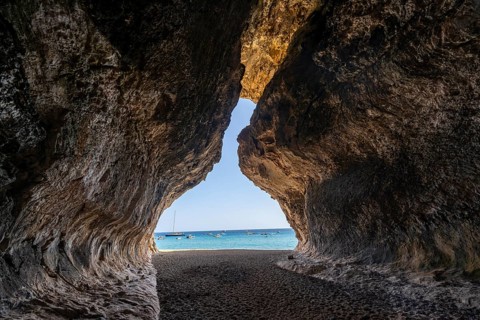 Rock cave on the beach at Cala Luna, Golfo di Orosei, Baunei, Sardinia, Italy